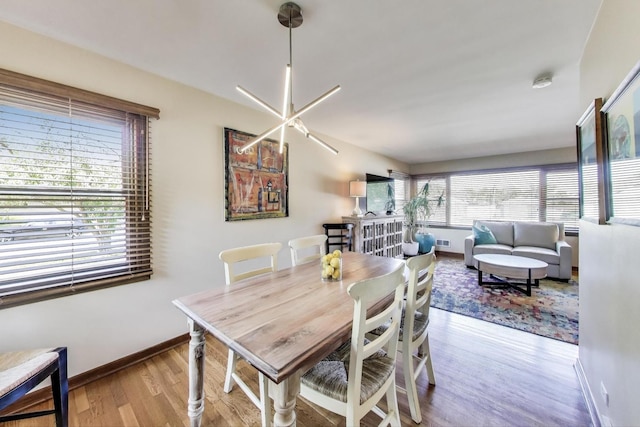 7203 W Lill St, Niles, IL 60714 - dining room featuring wood finished floors and baseboards