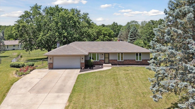 11740 Wagon Ln, Roscoe, IL 61073 - single story home featuring brick siding, concrete driveway, a garage, and roof with shingles