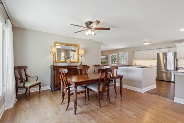 11740 Wagon Ln, Roscoe, IL 61073 - dining room with light wood finished floors and ceiling fan