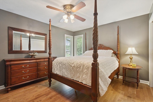11740 Wagon Ln, Roscoe, IL 61073 - bedroom featuring light wood-style floors and a ceiling fan