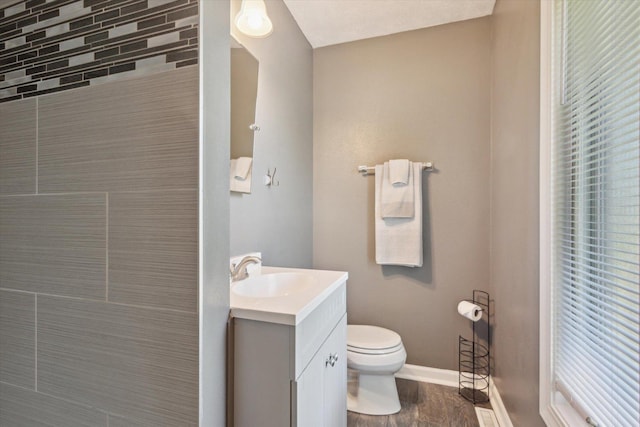 11740 Wagon Ln, Roscoe, IL 61073 - bathroom featuring vanity and wood finished floors