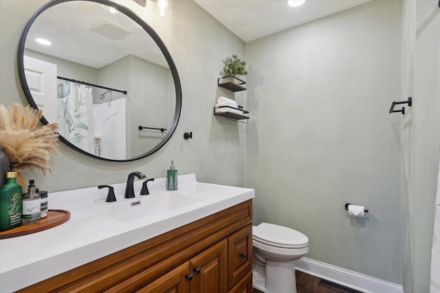 11740 Wagon Ln, Roscoe, IL 61073 - full bathroom featuring vanity, wood finished floors, recessed lighting, and a shower with shower curtain