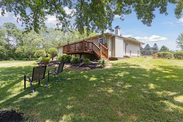 11740 Wagon Ln, Roscoe, IL 61073 - view of yard with a wooden deck and stairs