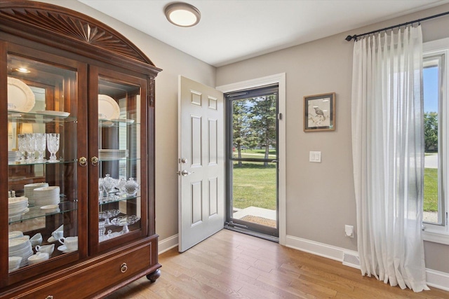 11740 Wagon Ln, Roscoe, IL 61073 - foyer entrance with plenty of natural light and light wood finished floors
