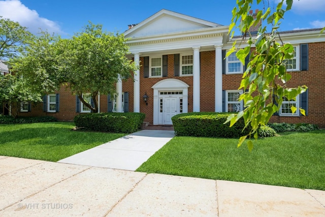 521 Coventry Ln Unit 3, Crystal Lake, IL 60014 - greek revival house featuring a front yard and brick siding