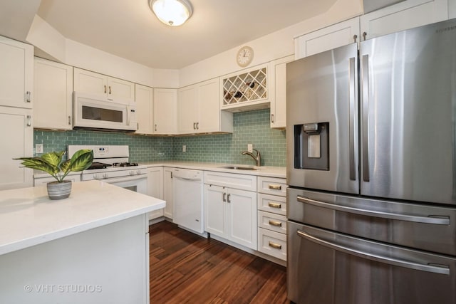 521 Coventry Ln Unit 3, Crystal Lake, IL 60014 - kitchen featuring white appliances, light countertops, dark wood-style flooring, and white cabinets