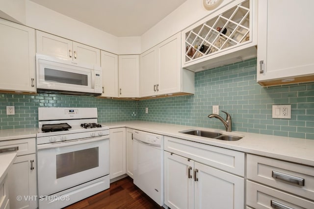 521 Coventry Ln Unit 3, Crystal Lake, IL 60014 - kitchen featuring white appliances, light countertops, white cabinets, tasteful backsplash, and dark wood-type flooring