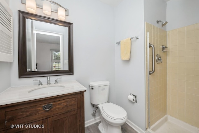 521 Coventry Ln Unit 3, Crystal Lake, IL 60014 - bathroom featuring a tile shower and vanity