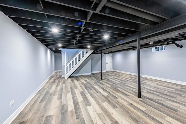 22W046 Mccormick Ave, Glen Ellyn, IL 60137 - basement featuring stairs and wood finished floors