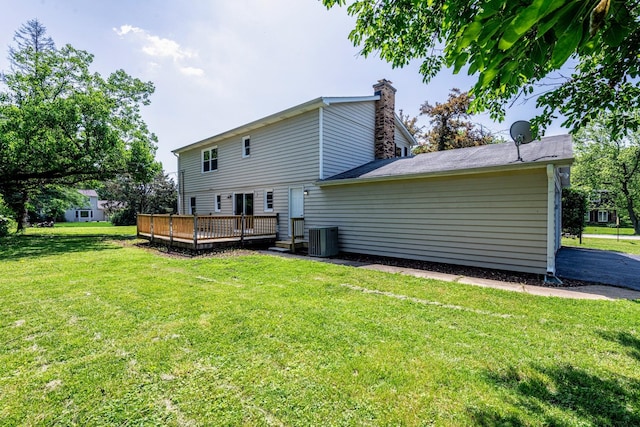 22W046 Mccormick Ave, Glen Ellyn, IL 60137 - back of house with a wooden deck, a yard, and a chimney