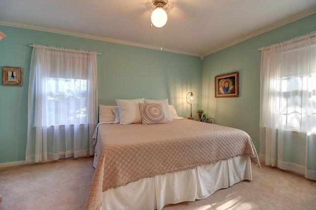 410 W 12th St, Sterling, IL 61081 - bedroom with light colored carpet, crown molding, and ceiling fan