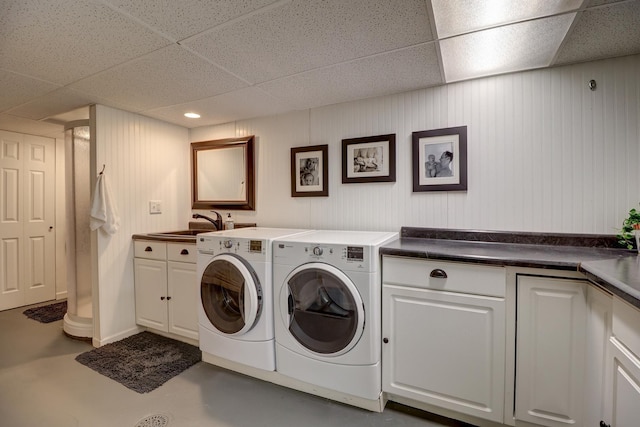 410 W 12th St, Sterling, IL 61081 - washroom with washer and clothes dryer, recessed lighting, and cabinet space