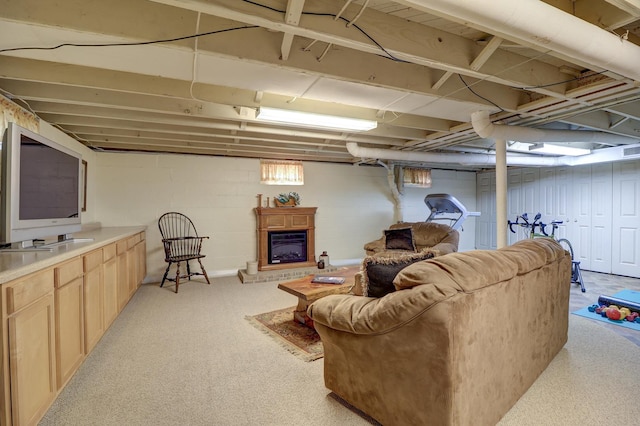410 W 12th St, Sterling, IL 61081 - basement with a fireplace with raised hearth