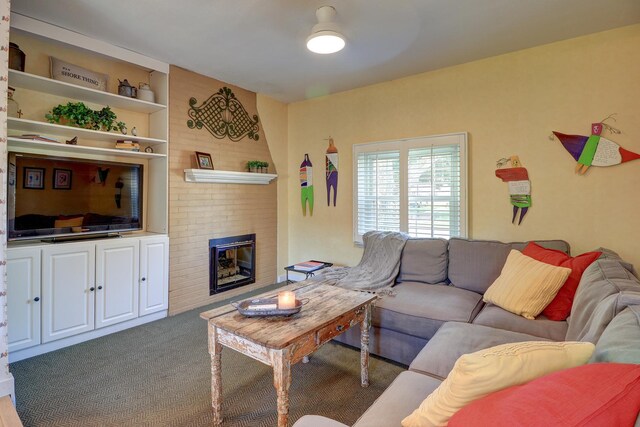 410 W 12th St, Sterling, IL 61081 - carpeted living room with a brick fireplace