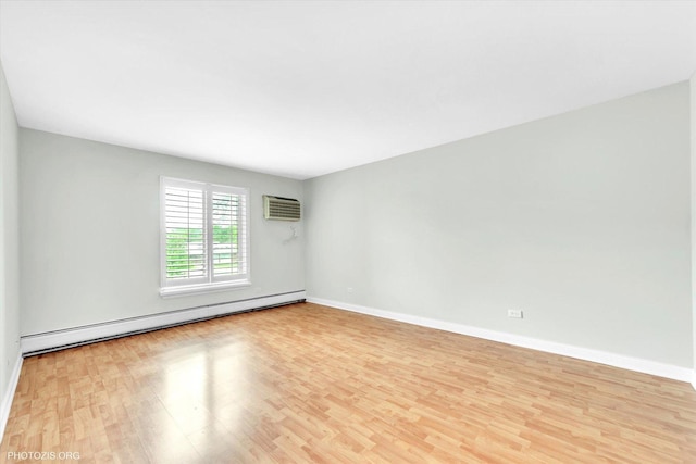 461 N Jonathan Dr Unit 204, Palatine, IL 60074 - unfurnished room featuring a baseboard radiator, wood finished floors, and an AC wall unit