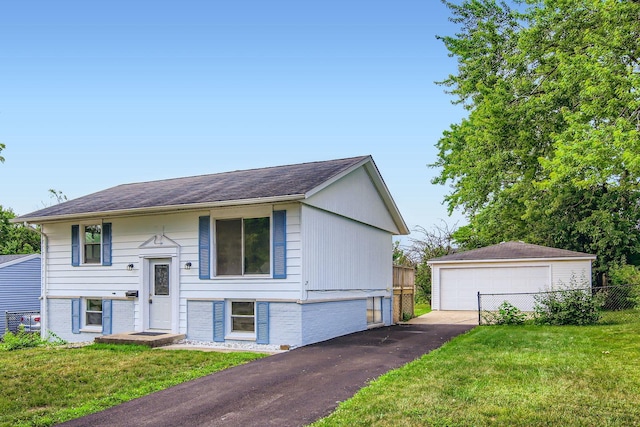 4723 Lee Ct, Richton Park, IL 60471 - bi-level home with a detached garage, an outbuilding, brick siding, and a shingled roof