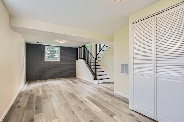 4723 Lee Ct, Richton Park, IL 60471 - below grade area featuring brick wall, light wood finished floors, and stairs