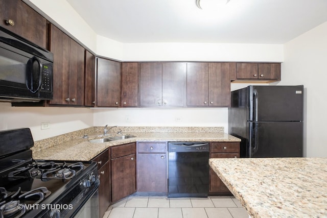 2030 W 111th St Unit 207, Chicago, IL 60643 - kitchen featuring black appliances, dark brown cabinets, light tile patterned flooring, and light stone countertops