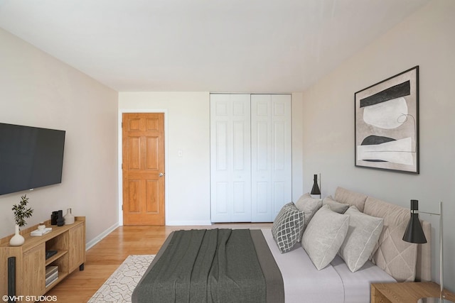2030 W 111th St Unit 207, Chicago, IL 60643 - bedroom featuring light wood finished floors and a closet