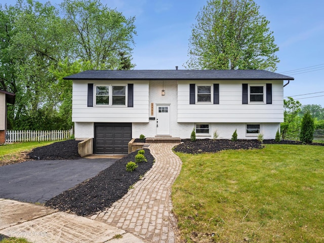 6950 Longmeadow Ln, Hanover Park, IL 60133 - bi-level home with driveway and a garage