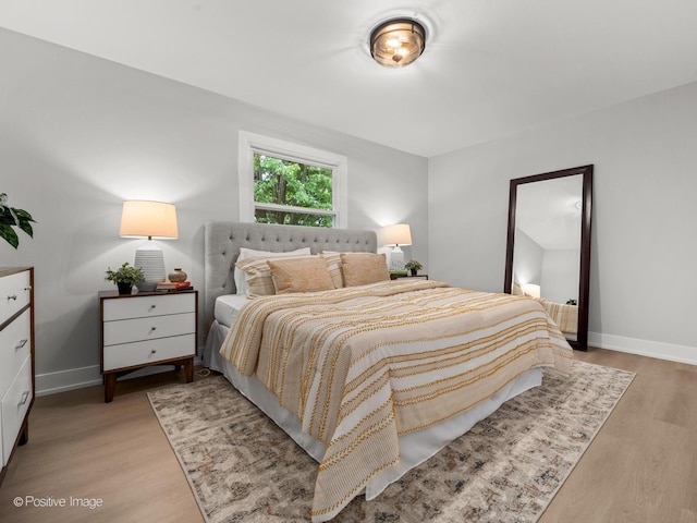 6950 Longmeadow Ln, Hanover Park, IL 60133 - bedroom with light wood finished floors