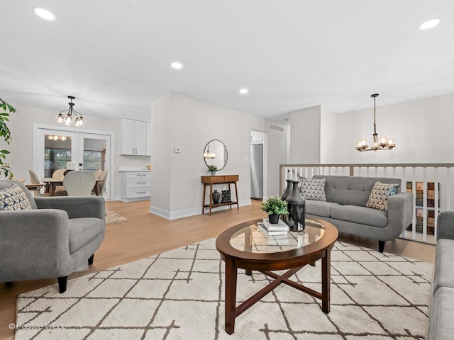 6950 Longmeadow Ln, Hanover Park, IL 60133 - living area with a chandelier, light wood-style floors, and recessed lighting