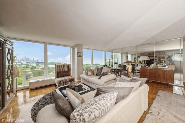 601 E 32nd St Unit Ph5, Chicago, IL 60616 - living area featuring a skyline view and healthy amount of natural light