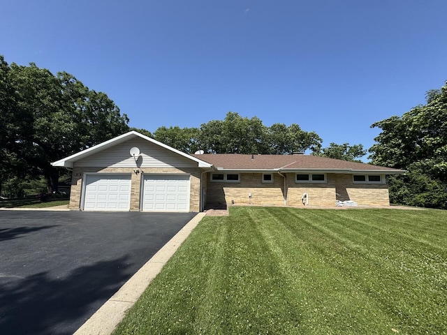 26575 N Fairfield Rd, Wauconda, IL 60084 - ranch-style home featuring driveway, a front yard, an attached garage, and brick siding