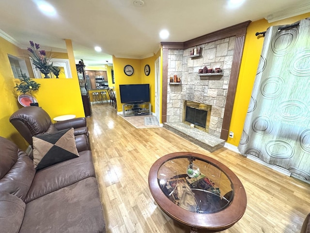 26575 N Fairfield Rd, Wauconda, IL 60084 - living room with crown molding, wood finished floors, and a fireplace