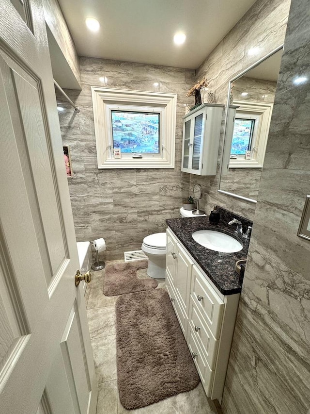 26575 N Fairfield Rd, Wauconda, IL 60084 - bathroom featuring vanity and tile walls