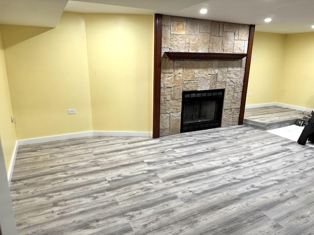 26575 N Fairfield Rd, Wauconda, IL 60084 - unfurnished living room featuring wood finished floors, recessed lighting, and a large fireplace