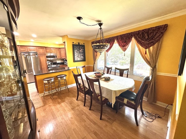 26575 N Fairfield Rd, Wauconda, IL 60084 - dining room featuring crown molding and light wood finished floors