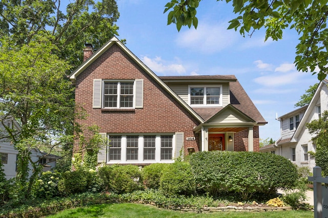 3838 Johnson Ave, Western Springs, IL 60558 - view of front of home featuring brick siding, a chimney, and a shingled roof