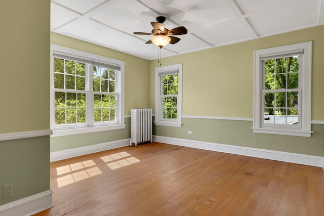 3838 Johnson Ave, Western Springs, IL 60558 - spare room with radiator, hardwood / wood-style flooring, and a ceiling fan