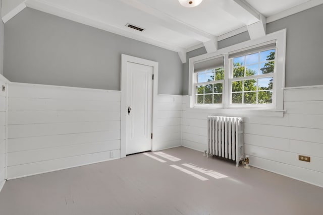 3838 Johnson Ave, Western Springs, IL 60558 - unfurnished bedroom with radiator heating unit, wainscoting, beamed ceiling, and wood walls