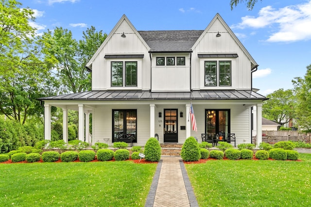 125 S Madison St, Hinsdale, IL 60521 - modern inspired farmhouse with a standing seam roof, a porch, and a shingled roof