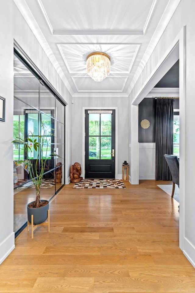 125 S Madison St, Hinsdale, IL 60521 - entryway with a chandelier, wood finished floors, and crown molding