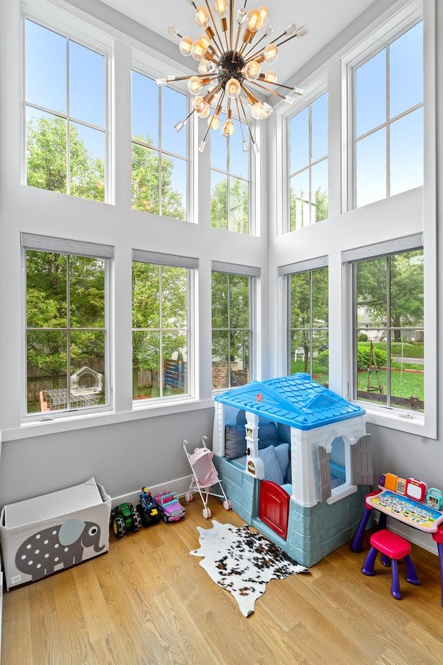 125 S Madison St, Hinsdale, IL 60521 - sunroom featuring a chandelier