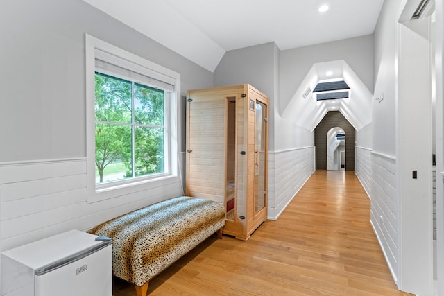 125 S Madison St, Hinsdale, IL 60521 - bedroom with vaulted ceiling, light wood-style floors, recessed lighting, and wooden walls