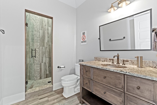 125 S Madison St, Hinsdale, IL 60521 - bathroom featuring vanity, a shower stall, and wood finished floors