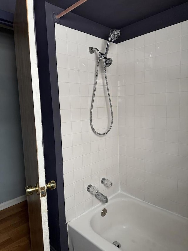 5814 S Laflin St, Chicago, IL 60636 - full bath with tub / shower combination and wood finished floors