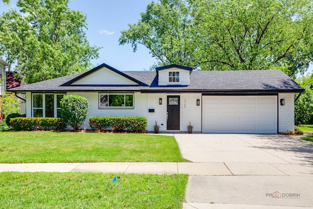 1729 N Mitchell Ave, Arlington Heights, IL 60004 - view of front of property with a garage, driveway, a front lawn, and roof with shingles