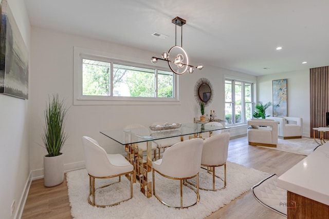 1729 N Mitchell Ave, Arlington Heights, IL 60004 - dining room featuring healthy amount of natural light, light wood-style floors, recessed lighting, and a chandelier