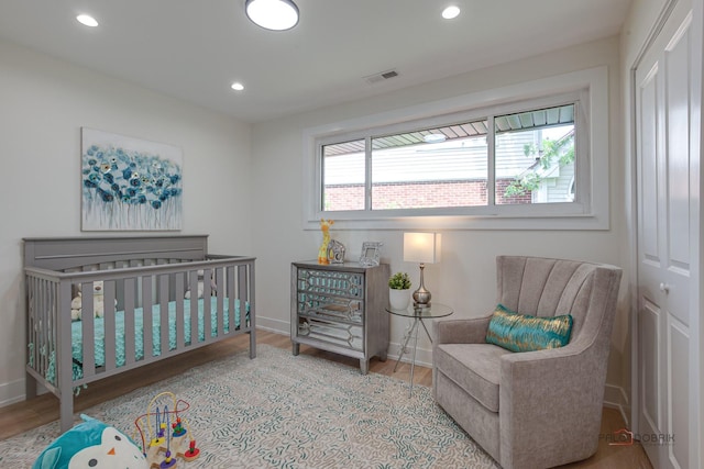 1729 N Mitchell Ave, Arlington Heights, IL 60004 - bedroom featuring wood finished floors, a closet, and recessed lighting