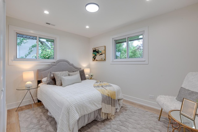 1729 N Mitchell Ave, Arlington Heights, IL 60004 - bedroom with multiple windows, light wood finished floors, and recessed lighting