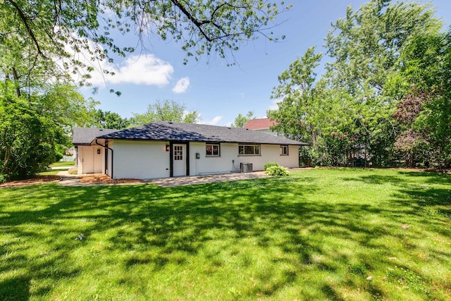1729 N Mitchell Ave, Arlington Heights, IL 60004 - back of house with a lawn, a patio area, and stucco siding