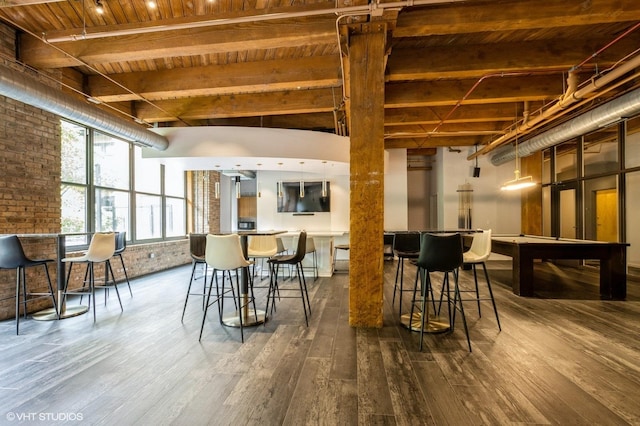1040 W Adams St Unit 406, Chicago, IL 60607 - interior space featuring dark wood finished floors, a wood ceiling with exposed beams, and brick wall