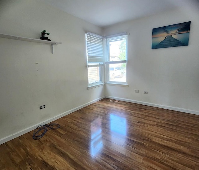 614 Lyon Ct, Buffalo Grove, IL 60089 - unfurnished room featuring wood finished floors and baseboards