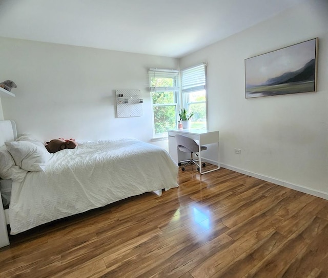 614 Lyon Ct, Buffalo Grove, IL 60089 - bedroom featuring wood finished floors and an office area