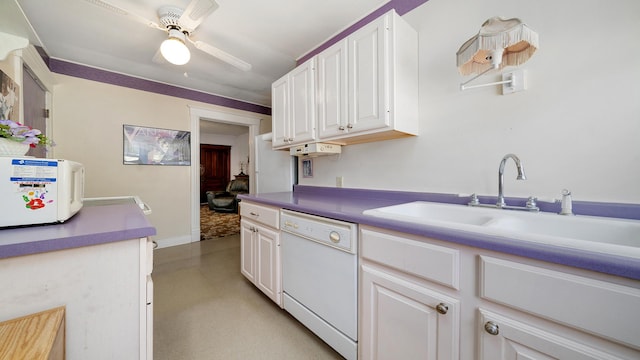 215 E 3rd St, Byron, IL 61010 - kitchen featuring dishwasher, white cabinets, and a ceiling fan